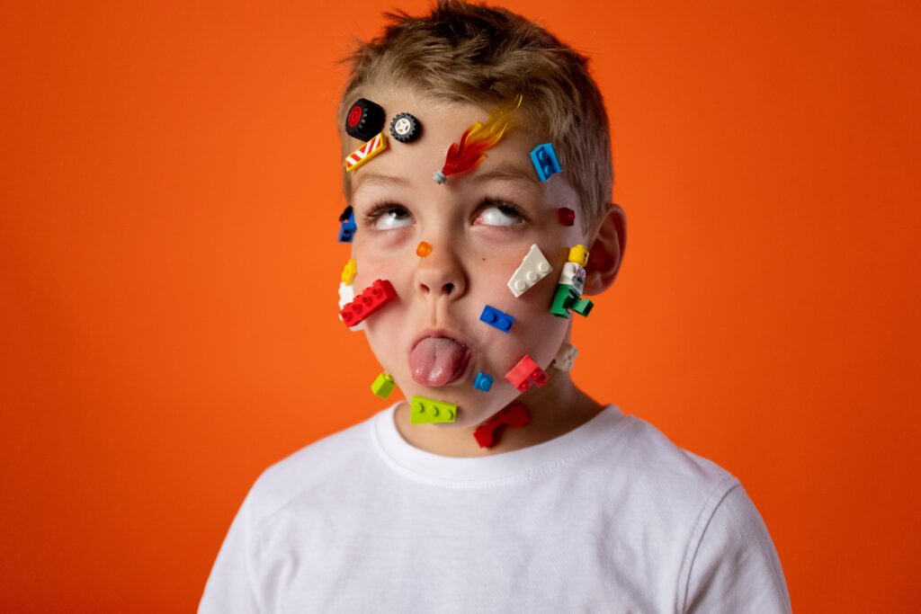 child playing with legos